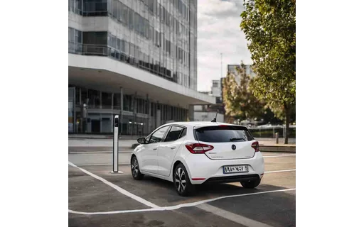Preview of White electric hatchback at a (JPEG q25)